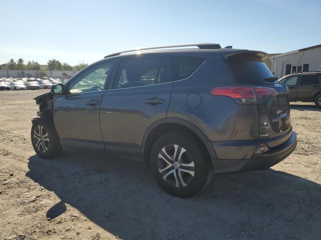 Photo 2 from auction – 2017 TOYOTA RAV4 LE with VIN JTMZFREV7HJ128532