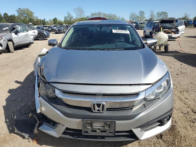 Photo 5 from auction – 2016 HONDA CIVIC EX with VIN 2HGFC1F34GH637120