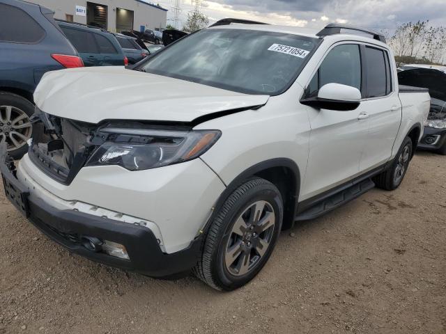 HONDA RIDGELINE 2017 with VIN 5FPYK3F62HB032320 - Photo from auction