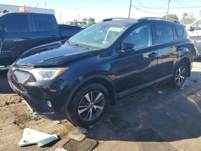 Photo 1 from auction – 2017 TOYOTA RAV4 XLE with VIN 2T3RFREV5HW681164