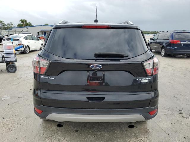 Photo 6 from auction – 2017 FORD ESCAPE TIT with VIN 1FMCU0J92HUC56087