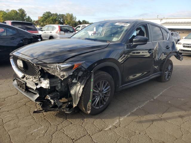 MAZDA CX-5 SPORT 2021 with VIN JM3KFBBMXM0354575 - Photo from auction