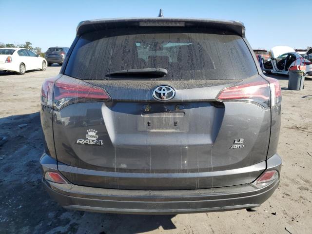 Photo 6 from auction – 2018 TOYOTA RAV4 LE with VIN 2T3BFREV3JW856339