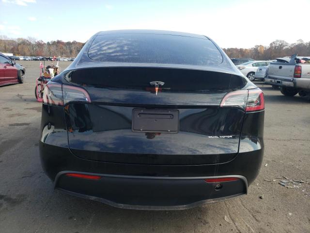Photo 6 from auction – 2023 TESLA MODEL Y with VIN 7SAYGAEE2PF919117