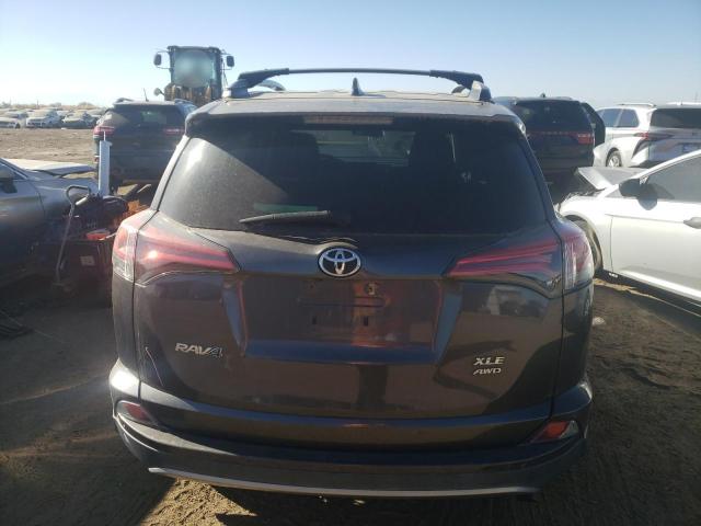 Photo 6 from auction – 2017 TOYOTA RAV4 XLE with VIN 2T3RFREV7HW633228