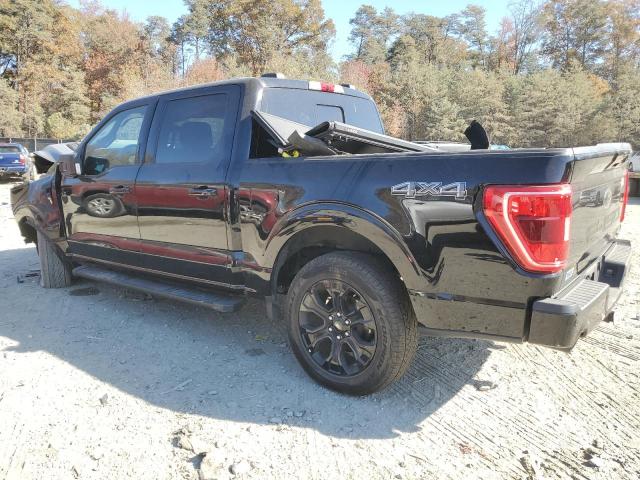 Photo 2 from auction – 2022 FORD F150 SUPER with VIN 1FTFW1E80NFA98156