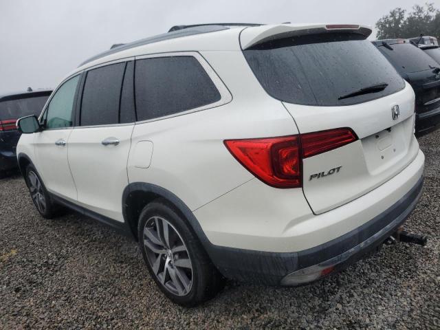 Photo 2 from auction – 2017 HONDA PILOT TOUR with VIN 5FNYF6H90HB035688