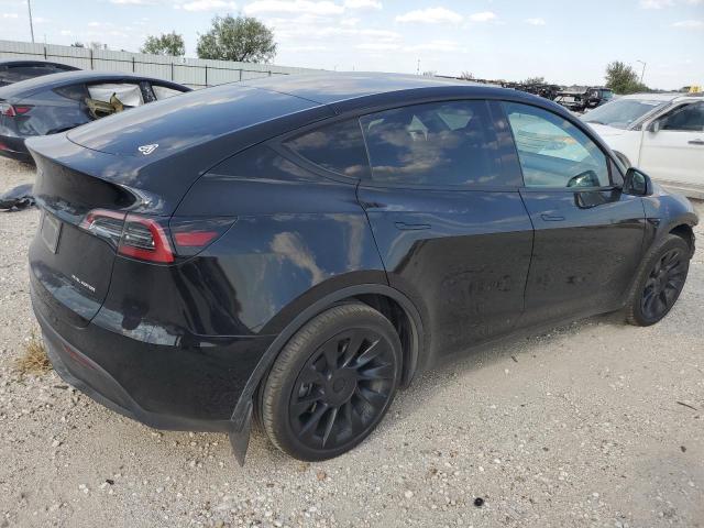 Photo 3 from auction – 2023 TESLA MODEL Y with VIN 7SAYGDEE6PA169185