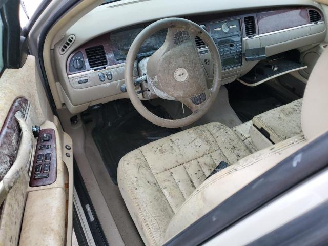 Photo 8 from auction – 2004 LINCOLN TOWN CAR E with VIN 1LNHM81W94Y677804