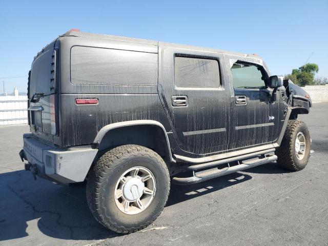 Photo 3 from auction – 2004 HUMMER H2 with VIN 5GRGN23U24H104327