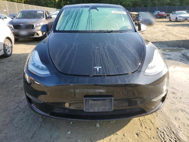 Photo 5 from auction – 2023 TESLA MODEL Y with VIN 7SAYGDEE8PA139296