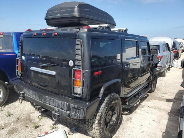 Photo 3 from auction – 2003 HUMMER H2 with VIN 5GRGN23U33H114427