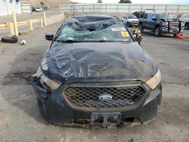Photo 5 from auction – 2014 FORD TAURUS POL with VIN 1FAHP2L8XEG148883