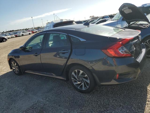 Photo 2 from auction – 2018 HONDA CIVIC EX with VIN 19XFC2F89JE028429