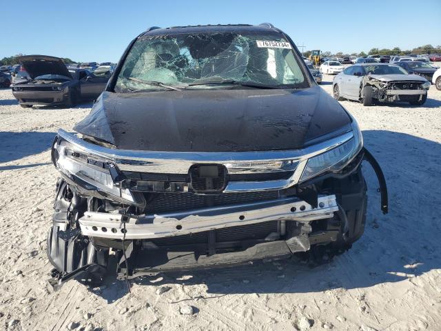 Photo 5 from auction – 2019 HONDA PILOT TOUR with VIN 5FNYF5H99KB013691
