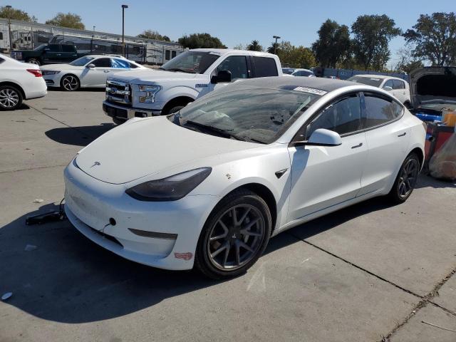 TESLA MODEL 3 2023 with VIN 5YJ3E1EA7PF612438 - Photo from auction