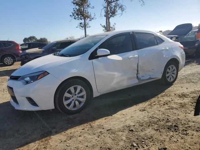 TOYOTA COROLLA L 2016 with VIN 5YFBURHE9GP553571 - Photo from auction