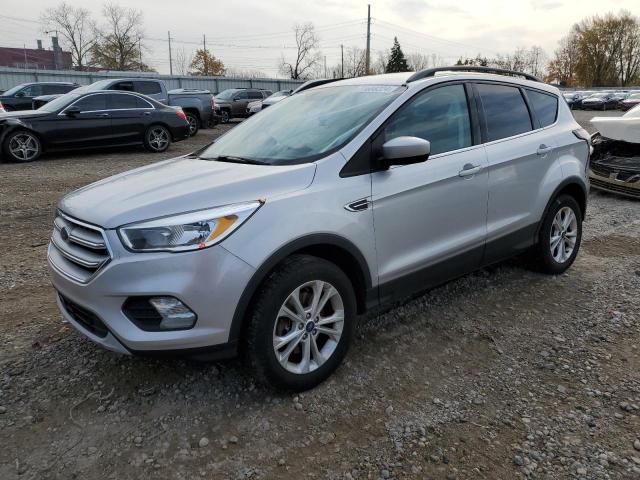 FORD ESCAPE SE 2018 with VIN 1FMCU9GDXJUB10915 - Photo from auction