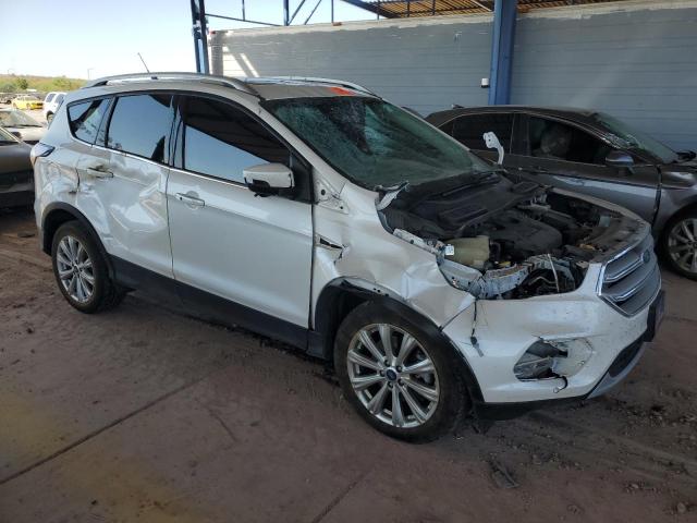 Photo 4 from auction – 2018 FORD ESCAPE TIT with VIN 1FMCU9J98JUC07888