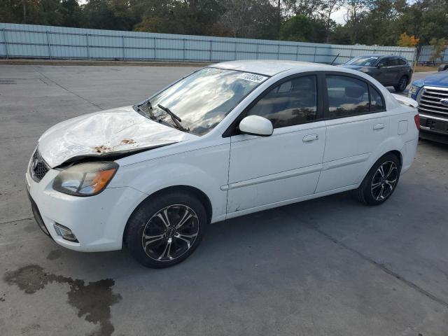 KIA RIO BASE 2011 with VIN KNADH4A34B6911004 - Photo from auction