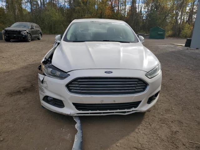 Photo 5 from auction – 2015 FORD FUSION SE with VIN 3FA6P0LU5FR147952