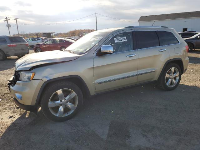 JEEP GRAND CHER 2011 with VIN 1J4RR6GG1BC670185 - Photo from auction