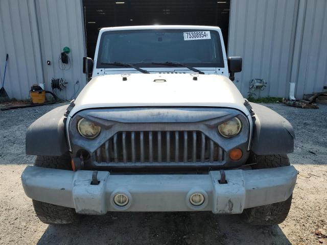 Photo 5 from auction – 2011 JEEP WRANGLER S with VIN 1J4AA2D1XBL501442
