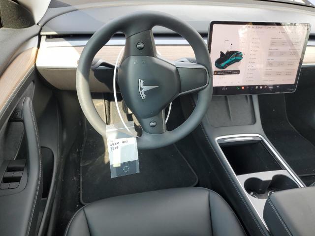 Photo 8 from auction – 2023 TESLA MODEL 3 with VIN LRW3E1FA4PC920949