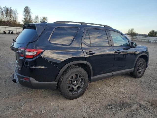 Photo 3 from auction – 2023 HONDA PILOT TRAI with VIN 5FNYG1H63PB017335