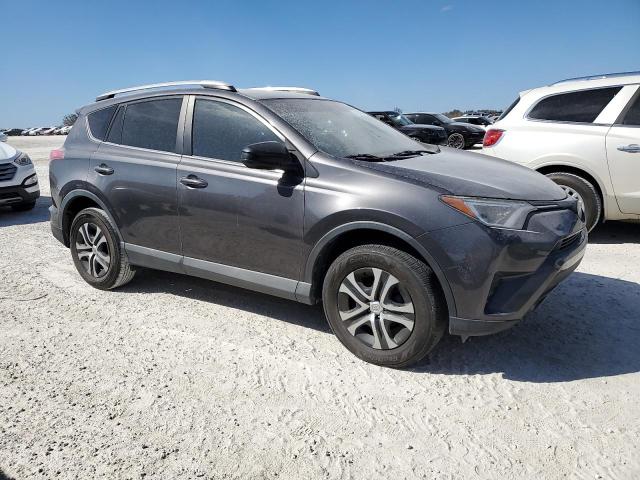 Photo 4 from auction – 2018 TOYOTA RAV4 LE with VIN 2T3ZFREV1JW478164