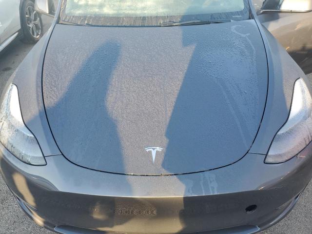Photo 12 from auction – 2023 TESLA MODEL Y with VIN 7SAYGDED4PF949129