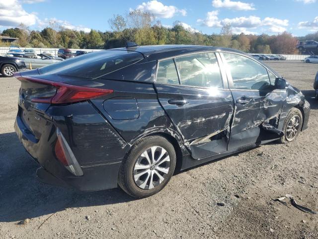 Photo 3 from auction – 2021 TOYOTA PRIUS PRIM with VIN JTDKAMFP3M3178104