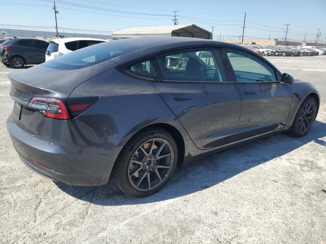 Photo 3 from auction – 2021 TESLA MODEL 3 with VIN 5YJ3E1EA5MF068839