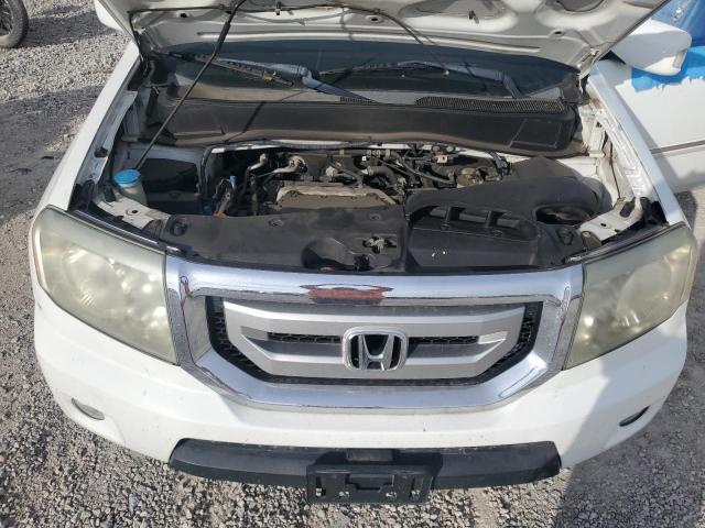 Photo 12 from auction – 2009 HONDA PILOT TOUR with VIN 5FNYF48989B019048