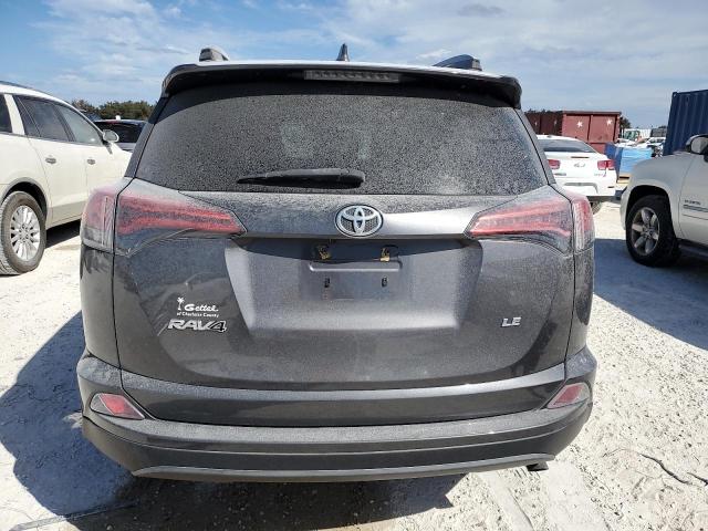 Photo 6 from auction – 2018 TOYOTA RAV4 LE with VIN 2T3ZFREV1JW478164
