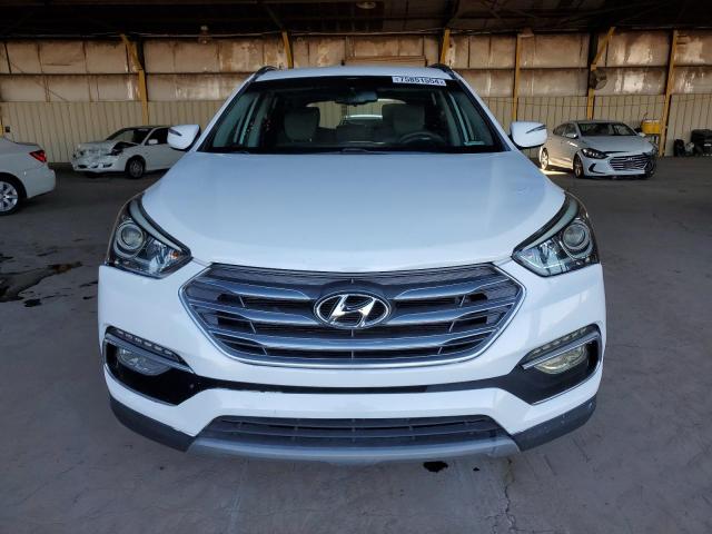 Photo 5 from auction – 2018 HYUNDAI SANTA FE S with VIN 5NMZU3LB4JH098476