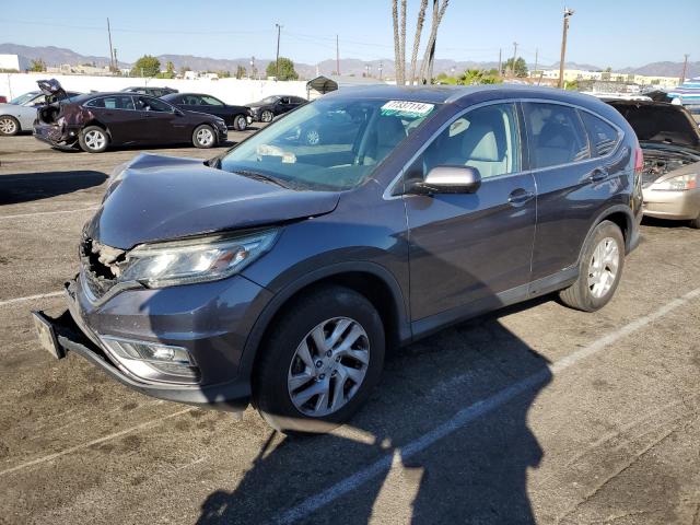 Photo 1 from auction – 2015 HONDA CR-V EXL with VIN 2HKRM4H76FH695519