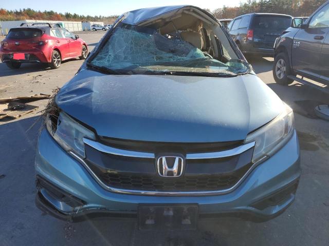 Photo 5 from auction – 2015 HONDA CR-V LX with VIN 5J6RM4H3XFL096903