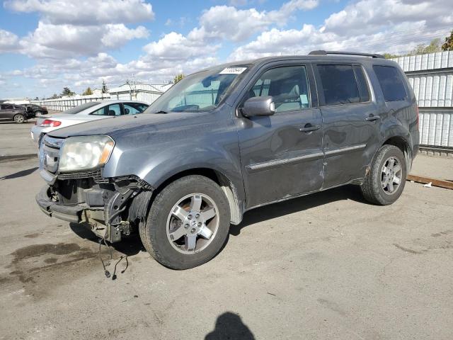 HONDA PILOT TOUR 2011 with VIN 5FNYF3H91BB051842 - Photo from auction
