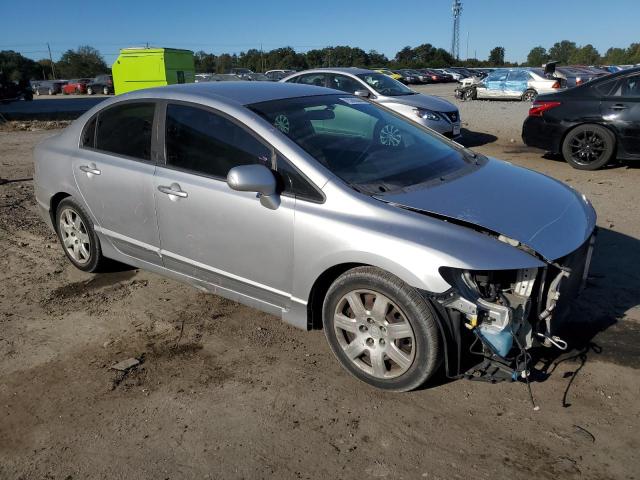 Photo 4 from auction – 2010 HONDA CIVIC LX with VIN 19XFA1F52AE077574