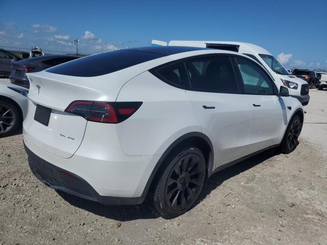 Снимка 3 от търг – 2023 TESLA MODEL Y с VIN 7SAYGDEE5PA031587