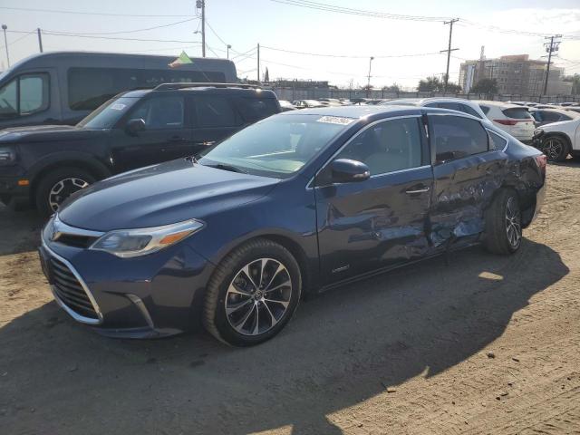 TOYOTA AVALON HYB 2016 with VIN 4T1BD1EB1GU049140 - Photo from auction