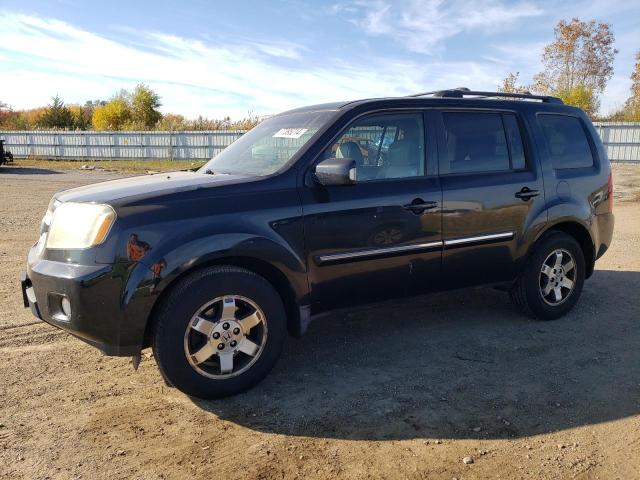 HONDA PILOT TOUR 2009 with VIN 5FNYF48829B016055 - Photo from auction