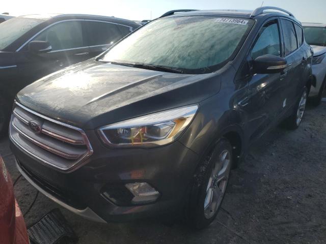 FORD ESCAPE TIT 2018 with VIN 1FMCU0J91JUC45085 - Photo from auction