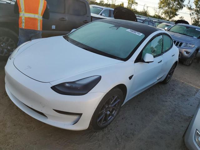 TESLA MODEL 3 2021 with VIN 5YJ3E1EAXMF963629 - Photo from auction