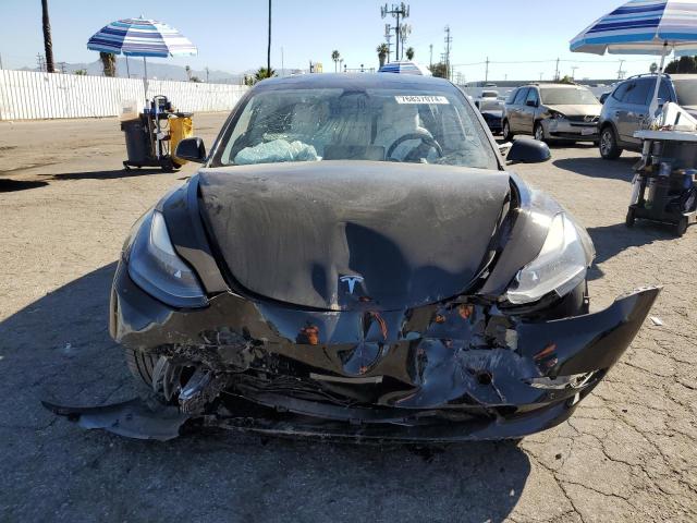 Photo 5 from auction – 2021 TESLA MODEL 3 with VIN 5YJ3E1EA5MF938590