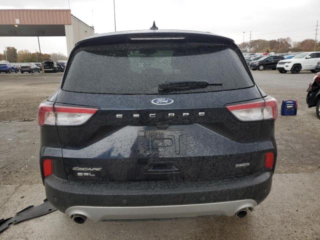 Photo 6 from auction – 2021 FORD ESCAPE SEL with VIN 1FMCU9CZ2MUA86082