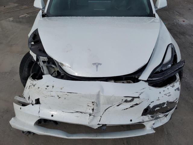 Photo 11 from auction – 2019 TESLA MODEL 3 with VIN 5YJ3E1EB7KF469749