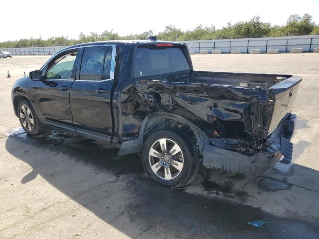 Photo 2 from auction – 2017 HONDA RIDGELINE with VIN 5FPYK2F60HB010813