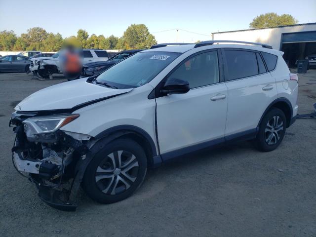 TOYOTA RAV4 LE 2018 with VIN JTMZFREV0JJ212293 - Photo from auction